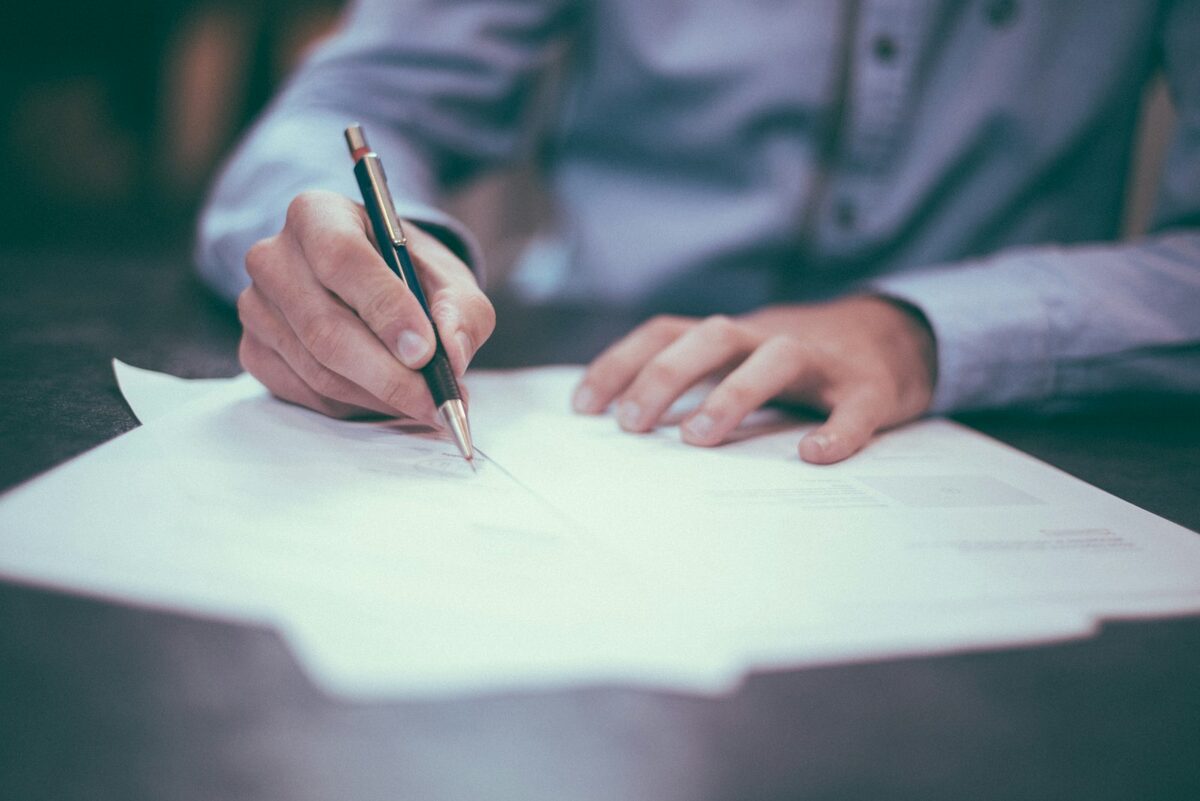 Reviewing case documents at a desk